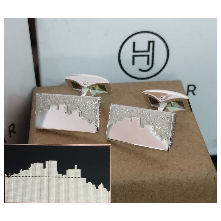 Gemelos perfil o skyline en plata de ley