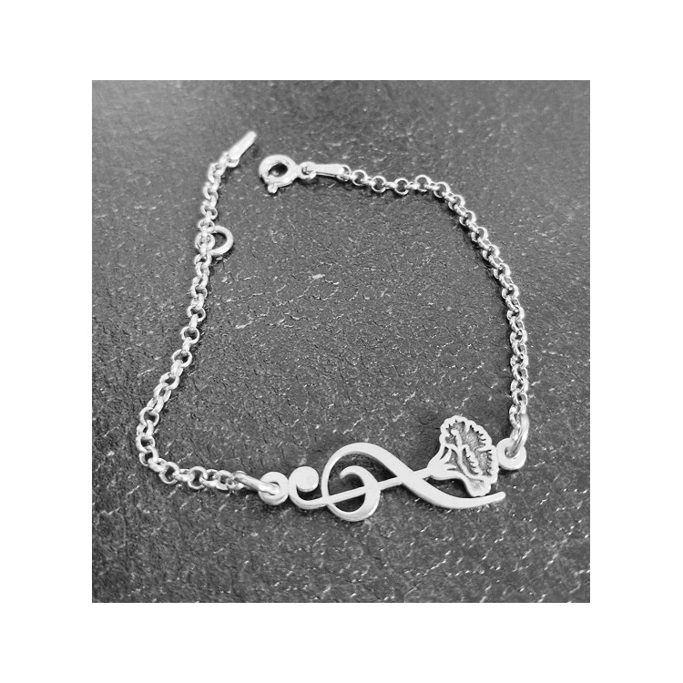 Pulsera nota musical flor  plata de ley
